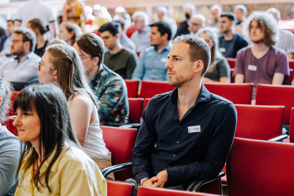 Kevin Mallinger sits in audience at SBA´s IMPACT