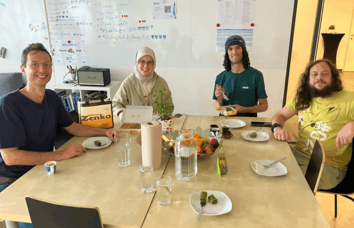group photo in social room with fatma